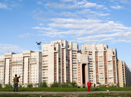 A man flies a kite near the Gulf of Finland.